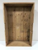 A pair of pine under-bed storage drawers