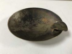 A silver ashtray