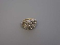 A large fancy diamond cluster ring