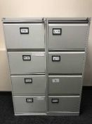Two x four drawer metal filing chests with keys