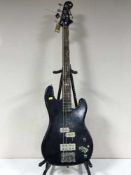 A Marlin Side Winder base guitar on stand