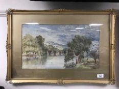A gilt framed watercolour - figures on a path, by J. A.