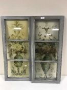 Three framed coloured glass panels of flowers