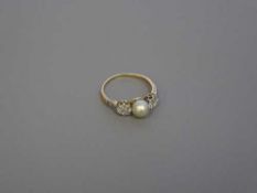 An early 18ct gold pearl and diamond ring