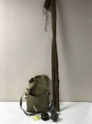 A two piece split cane fishing rod together with a fishing bag containing reels, line,