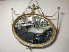 A late Victorian Adam style gilt framed overmantel mirror