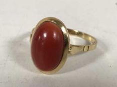 An 18ct gold and coral ring