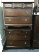 A pair of Stag Minstrel five drawer chests