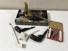 A tin of assorted lighters, Ronson lighter servicing kit,