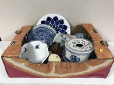 Two boxes of blue and white china in an oriental style and delft china