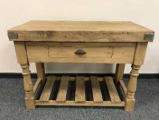 A reclaimed pine butcher's block fitted with a drawer