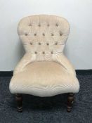 A pink button dralon lady's chair