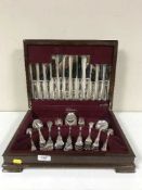 A mahogany canteen of Flexfit cutlery and a brass Corinthian column table lamp