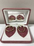 A pair of boxed 9ct gold hoop earrings