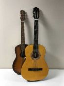 Two Spanish acoustic guitars and a Harmony acoustic guitar