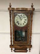 A Victorian inlaid mahogany eight day wall clock