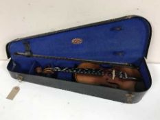 A German violin, with bow, in a fitted case manufactured by Rushworth & Draper of Liverpool.