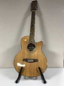 A Brunswick twelve string semi acoustic guitar on stand