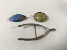 Three sterling silver brooches