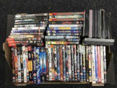A box of assorted DVDs