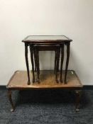 A nest of three inlaid mahogany tables and coffee table