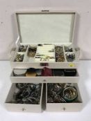 A leather jewellery box of assorted costume jewellery