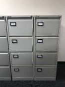 Two x four drawer metal filing chests with keys