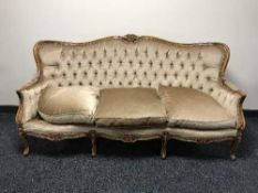 A continental style walnut framed three piece lounge suite