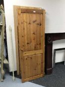 A flat pack pine double door wardrobe