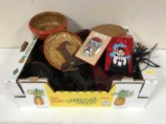 A box of wooden plate stands, carved vase stands,