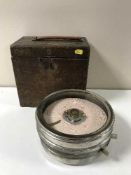 A cased pigeon timing clock