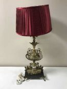 A French gilt decorative table lamp on marble base with shade