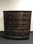 A Victorian bow-fronted six drawer chest