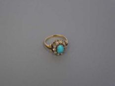 An antique turquoise and diamond cluster ring