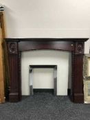A reproduction fire surround and marble back