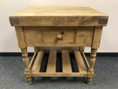 A reclaimed pine butcher's block fitted with a drawer