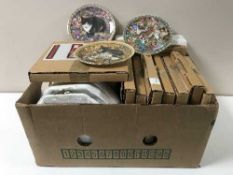 A box containing a large quantity of collector's plates and two boxes containing pottery teapot,