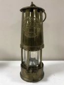 A brass Eccles Protector lamp type 6