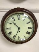 A mahogany cased station wall clock