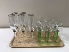 A tray of assorted glassware together with three lead crystal decanters with stoppers
