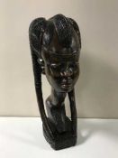 A large carved tribal bust