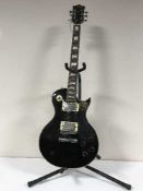 A Swift electric guitar on stand