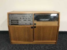 A 1970's Team 6000 stereo system in teak cabinet