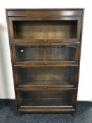 An oak Globe Wernicke style four tier stacking bookcase