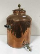 An antique copper and brass urn