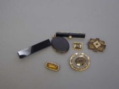 A good collection of seven Victorian brooches, mourning brooch, gold mounted locket etc.