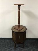 An octagonal cupboard and a plant stand