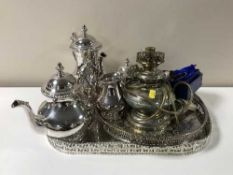 Two plated gallery trays containing a four piece plated Viners tea service, napkin rings,