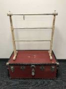 A stripped pine towel rail and a trunk