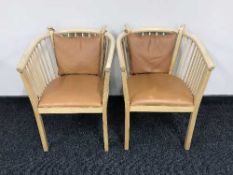 A pair of beech tub chairs